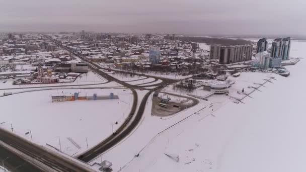 Aerial of bridge and car driving on the bridge, winter sunny day in Barnaul, Siberia, Russia. — Stock Video
