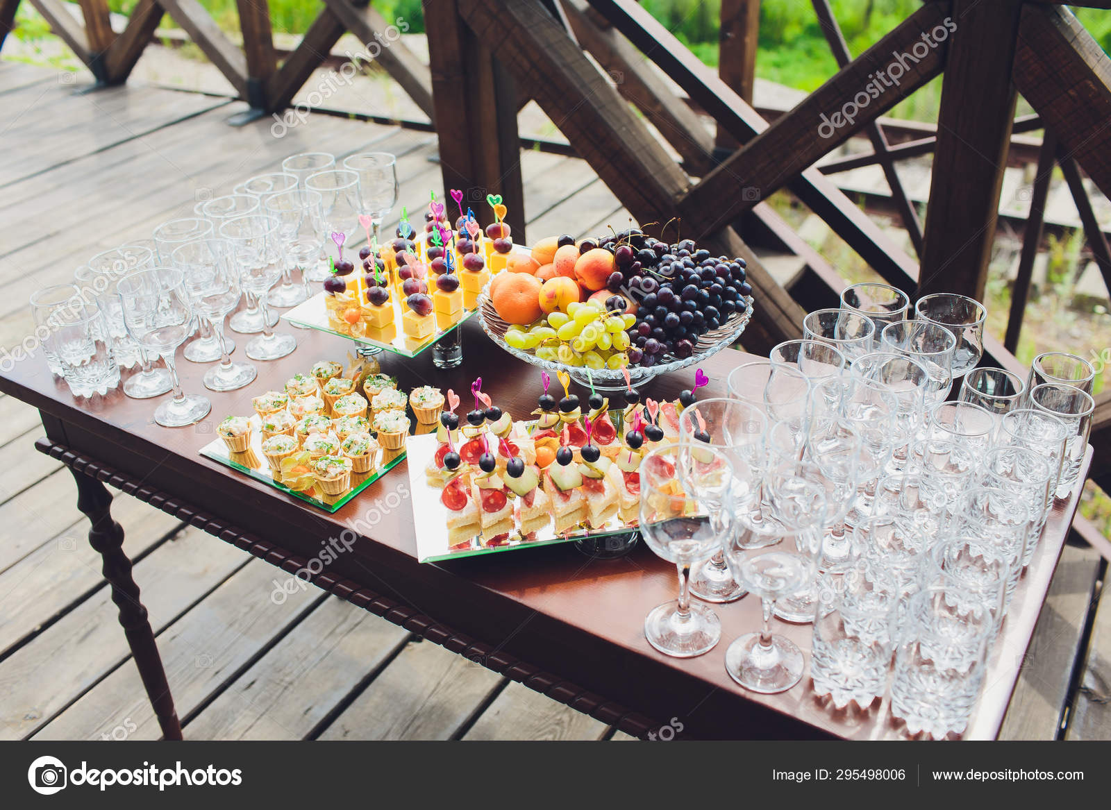Beautiful catering banquet buffet table decorated in rustic style