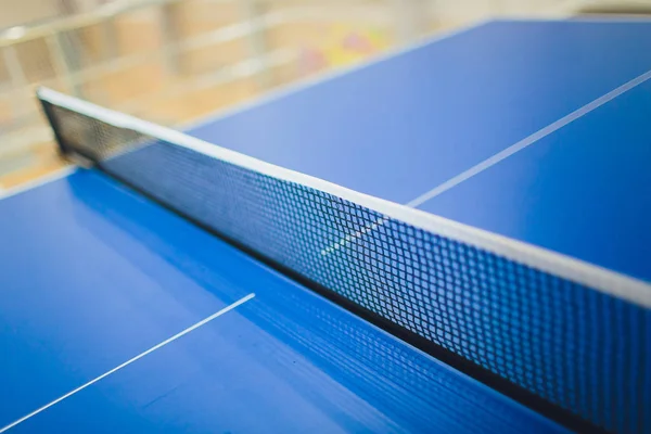 Tennis table of blue color, close-up empty.