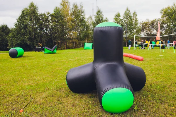 Part of a large color inflatable childrens attraction in the grass in the park. — Stock Photo, Image