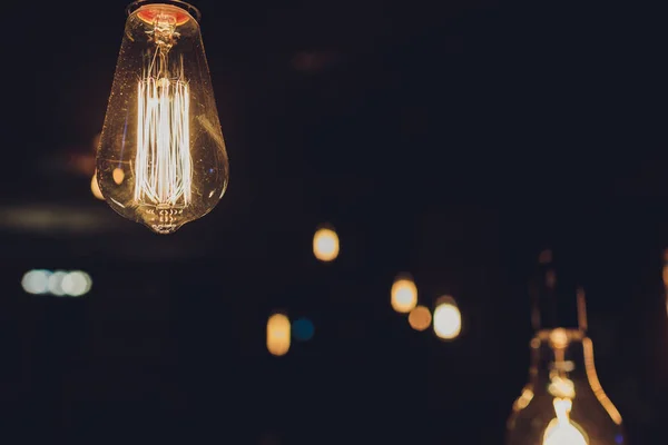 Lighting decor. Retro light bulb filament close up.Illuminated. — Stock Photo, Image