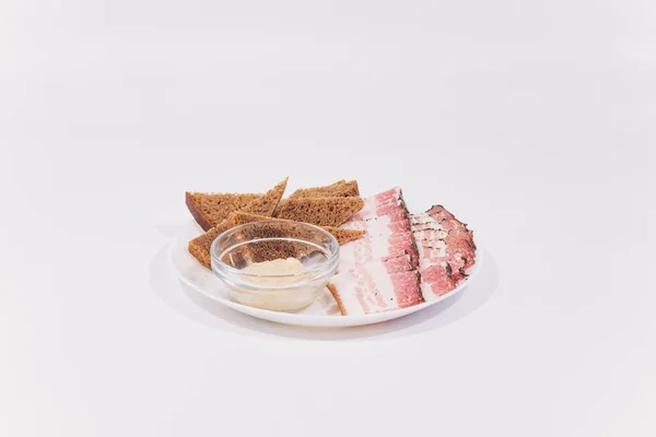 Sliced pork lard. Sliced bacon. Fat, tallow, grease, bacon. isolate white — Stock Photo, Image
