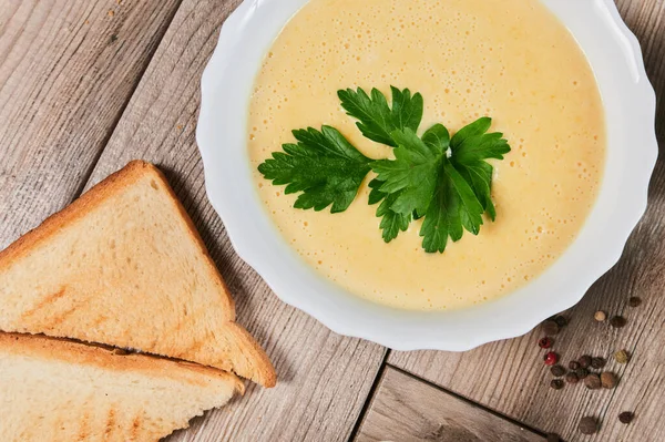 Different kinds of soups - pumpkin soup, cheese cream-soup and mushroom cream-soup on the table. — Stock Image Different kinds of soups - pumpkin soup, cheese cream-soup and mushroom cream-soup on the table. Stock Photo