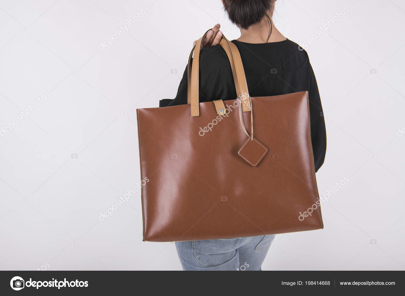 Download Girl Holding Brown Leather Bag Mockup Blank Template Isolated Gray Stock Photo C Baramee2017 198414668 PSD Mockup Templates