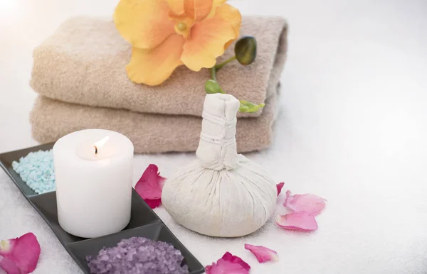 Spa accessories aromatic candle,compress ball, salt scrub and towel.