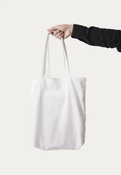 Hand Holding Bag Canvas Fabric Mockup Blank Template Isolated White — Stock Photo, Image