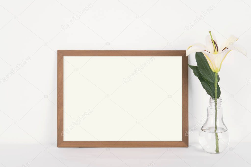 Blank Photo Frame Decoration on Wooden for Design Mockup Template.