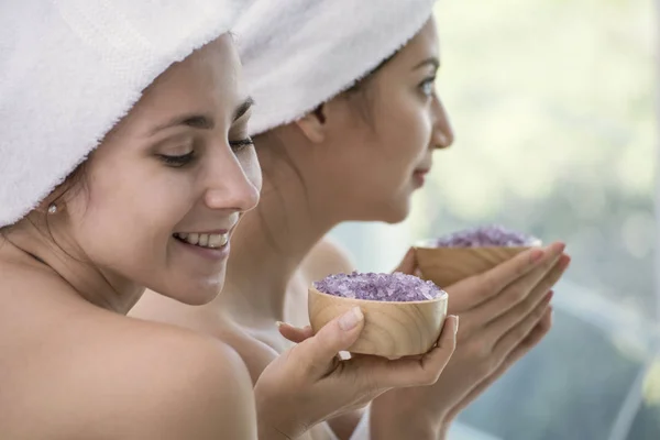 relaxation women with spa accessories aromatic salt scrub.