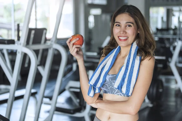 asian woman eating healthy apple. diet health lifestyle concept.