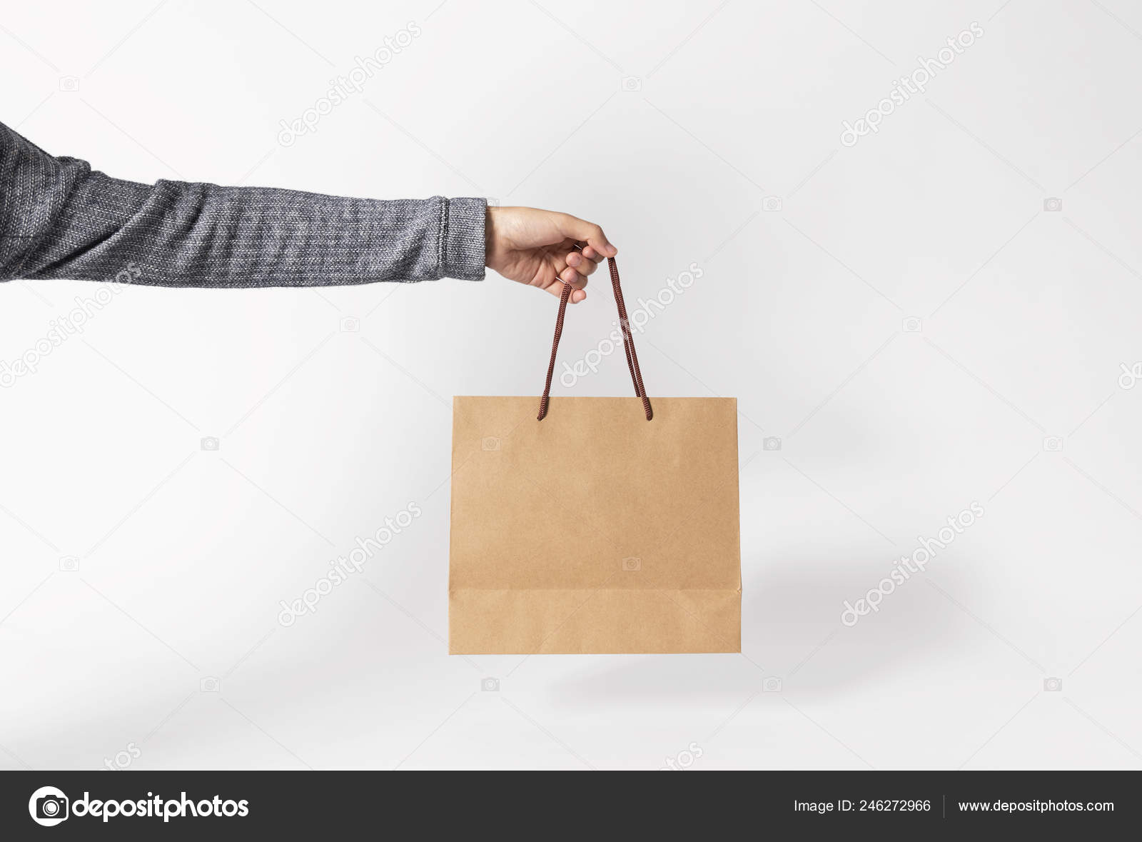 Download Hand Holding Blank Brown Paper Bag Mockup Template Advertising Branding Stock Photo C Baramee2017 246272966 PSD Mockup Templates