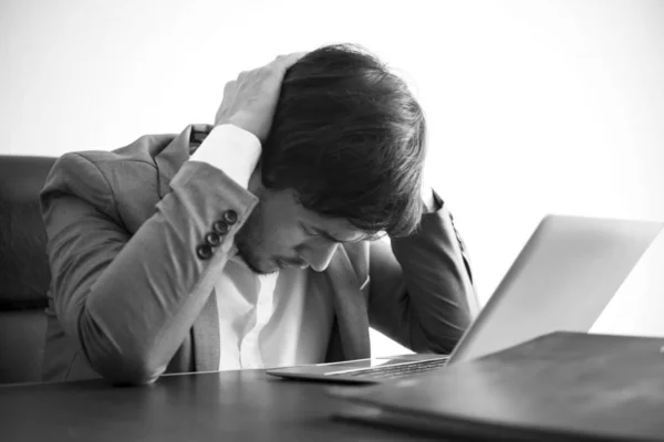 businessman stressed and unhappy for work in the office.