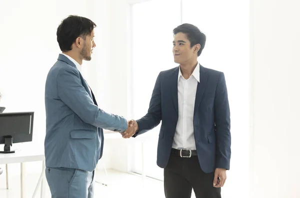 Businessmen making handshake agreement. concept partner
