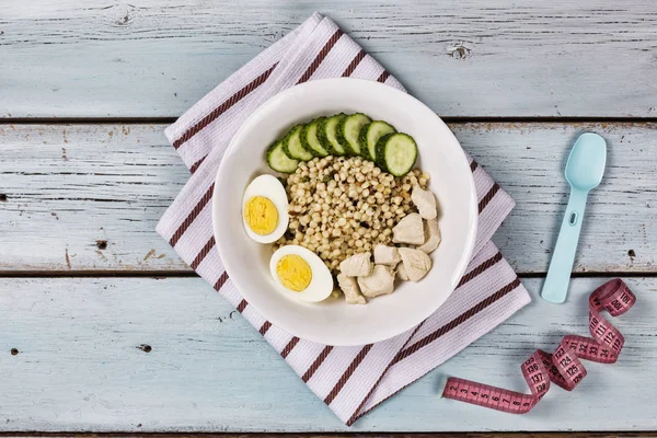 Plate of health. Diet. Trendy breakfast. Porridge eggs vegetables