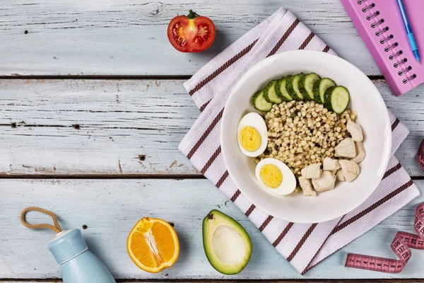 Plate of health. Diet. Trendy breakfast. Porridge eggs vegetables