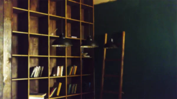 Imagen Fondo Borrosa Biblioteca Estanterías Con Libros Tres Lámparas Encendidas —  Fotos de Stock
