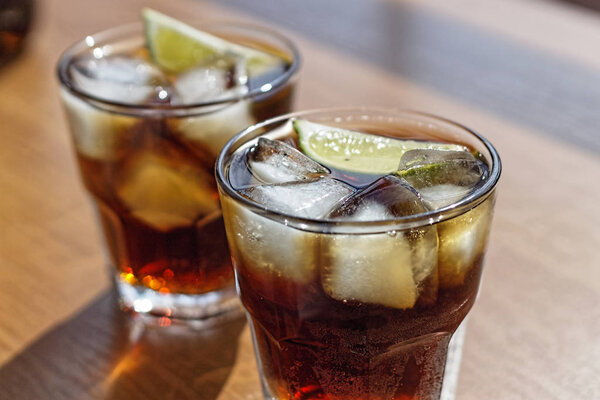 Rum. Cola Cuba Libre with Lime and Ice