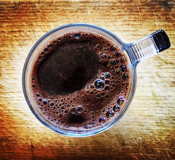 Tasse Köstlichen Schwarzen Kaffee Auf Einem Hölzernen Hintergrund Ansicht Von — Stockfoto