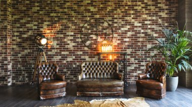 Oturma odasında pahalı bir dekor var. Deri koltuk ve sandalyeler tuğla duvara dayanıyor.