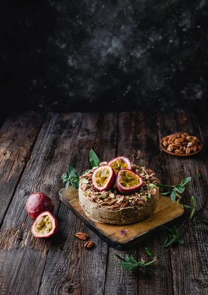 Cheesecake Nuts Maracuya Served Green Twigs Wooden Table — Stock Photo, Image