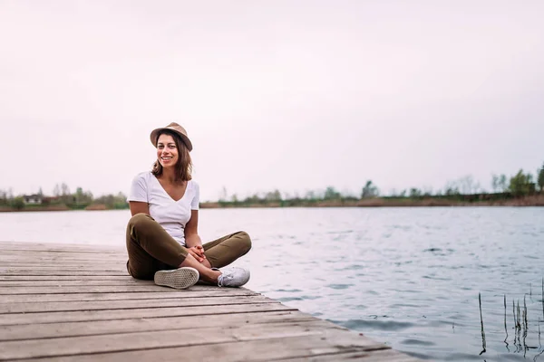 Young Woman Sitting Wooden Pier Relaxing — Stock Photo, Image