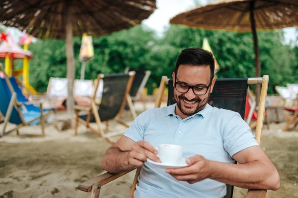 Smiling Young Man Drinking Cup Coffee Beach — Stock Photo, Image