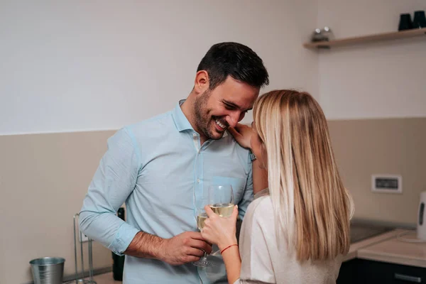 Beautiful Young Couple Drinking Wine Hugging While Standing — Stock Photo, Image