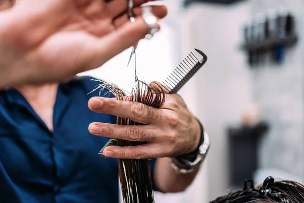 Professional hair cut. Close-up.