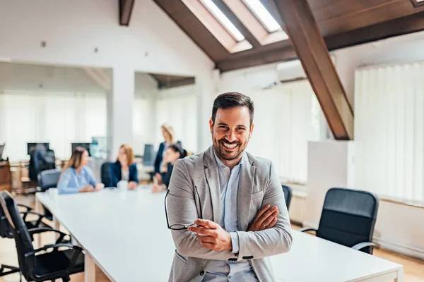 Portrait Smiling Handsome Businessman Crossed Arms Meeting Room — Stock Photo, Image