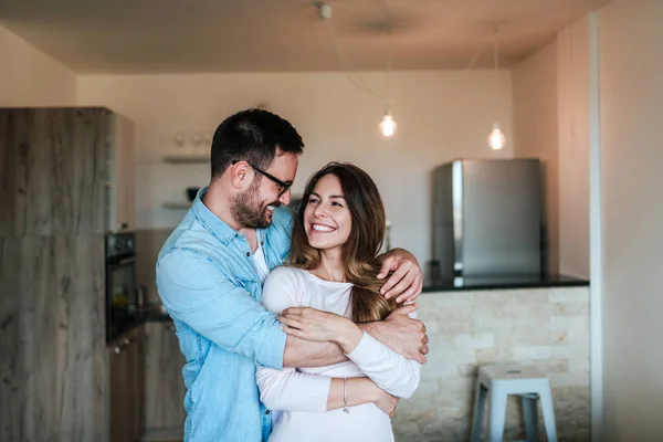 Happy Couple Hugging Home — Stock Photo, Image