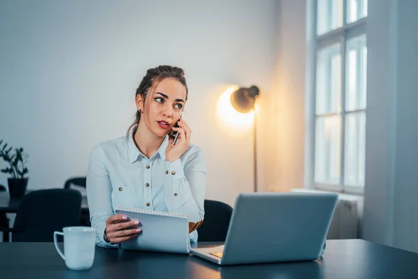 Portrait Young Woman Working Her Office Talking Mobile Phone While — Stock Photo, Image