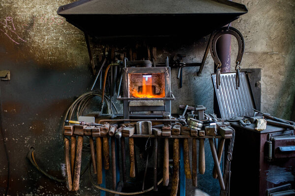 Old blacksmiths workshop indoors 