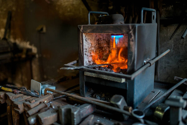 Old blacksmiths workshop indoors 