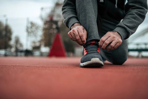 Tying Shoelaces Run Stadium Low Angle Image — Stock Photo, Image