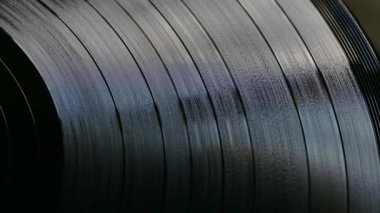 Vinil kaydı turntable dönüyor. Retro müzik. Temiz ses plaka. Soundtrack. Ses kayıt stüdyosu.