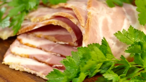Bacon sliced on a cutting board with greens. Meat dinner with parsley. — Stock Footage Bacon Sliced Cutting Board Greens Meat Dinner Parsley Royalty Free Stock Footage