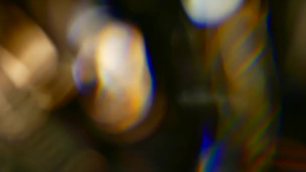 Abstrakti Monivärinen Glitter Mustalla Taustalla Hämärtynyt Väri Tekstuuri Heijastus Valonsäteet — kuvapankkivideo