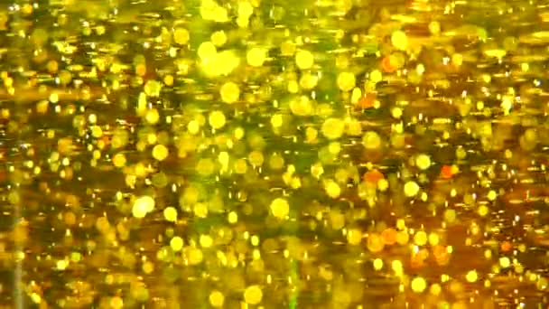 Tekstur Dengan Gelembung Emas Latar Belakang Kuning Cair Minyak Bunga — Stok Video