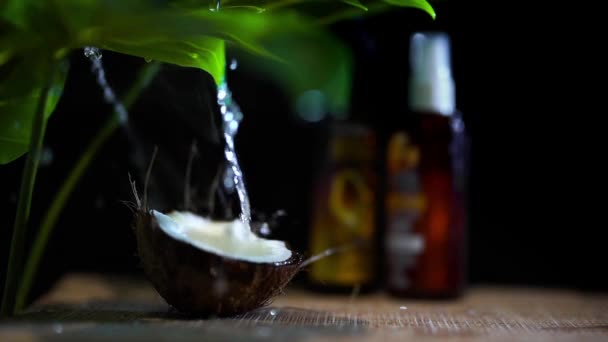 Coconut water splashing in super slow motion — Stock Video