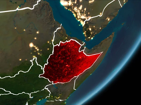 Ethiopia as seen from Earth orbit on planet Earth at night highlighted in red with visible borders and city lights. 3D illustration. Elements of this image furnished by NASA.