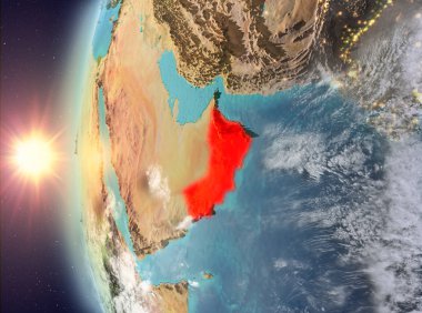 Gezegeni uzaydan günbatımı sırasında görülen Umman. 3D çizim. Nasa tarafından döşenmiş bu görüntü unsurları.