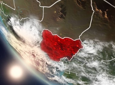 Dünya yörüngesi görünür ülke sınırları ile günbatımı sırasında görülen Nijerya Illustration. 3D çizim. Nasa tarafından döşenmiş bu görüntü unsurları.