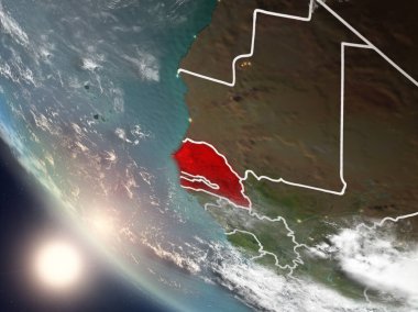Dünya yörüngesi görünür ülke sınırları ile günbatımı sırasında görülen Senegal Illustration. 3D çizim. Nasa tarafından döşenmiş bu görüntü unsurları.