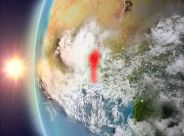 Gezegeni uzaydan günbatımı sırasında görülen Benin. 3D çizim. Nasa tarafından döşenmiş bu görüntü unsurları.