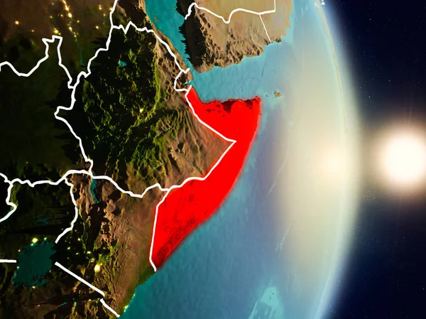 Somali red Planet Earth görünür ülke sınırları ile vurgulanmış gündoğumu sırasında. 3D çizim. Nasa tarafından döşenmiş bu görüntü unsurları.
