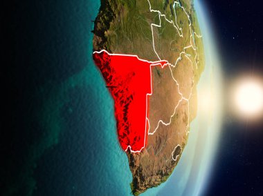 Namibya red Planet Earth görünür ülke sınırları ile vurgulanmış gündoğumu sırasında. 3D çizim. Nasa tarafından döşenmiş bu görüntü unsurları.