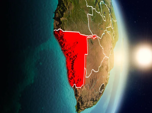 Namibya red Planet Earth görünür ülke sınırları ile vurgulanmış gündoğumu sırasında. 3D çizim. Nasa tarafından döşenmiş bu görüntü unsurları.