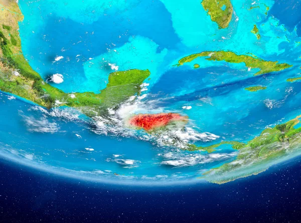 Honduras highlighted in red on planet Earth with clouds. 3D illustration. Elements of this image furnished by NASA.