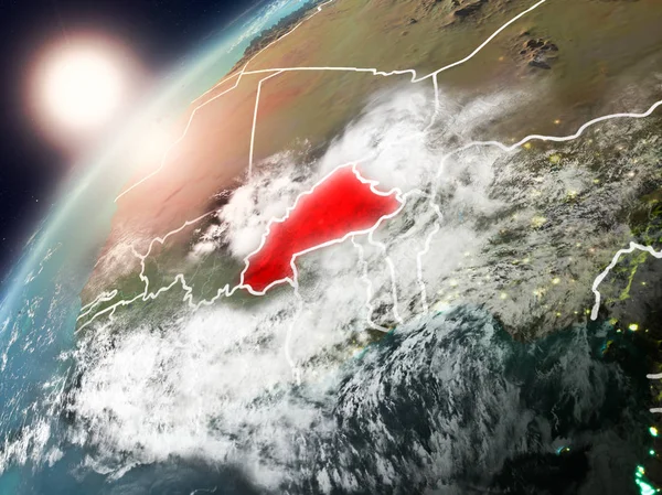 Burkina Faso red Planet Earth bulutlar ve görünür ülke sınırları ile vurgulanmış günbatımı sırasında. 3D çizim. Nasa tarafından döşenmiş bu görüntü unsurları.