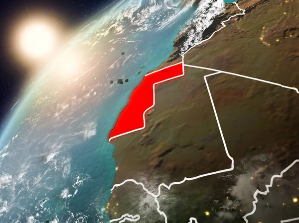 Western Sahara during sunset highlighted in red on planet Earth with clouds and visible country borders. 3D illustration. Elements of this image furnished by NASA.