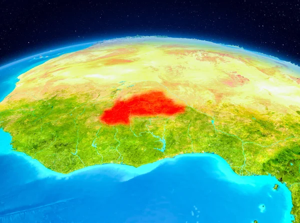 Satellite view of Burkina Faso highlighted in red on planet Earth. 3D illustration. Elements of this image furnished by NASA.